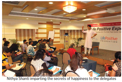 Nithya shanti imparting the secrets of happiness to the delegates